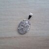 DIJE DE ACERO MEDALLA GAUCHITO GIL 14 X 20 MM