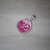 DIJE DE ACERO MEDALLA ESMALTADA 23 MM FUCSIA OHM