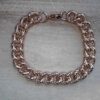 PULSERA DE ACERO ROSE GRUMET TRABAJADA.