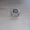 DIJE DE ACERO DONA SÍMIL 3 HILERAS DE BOLITAS. ANCHO 8 MM. DIÁMETRO 15 MM