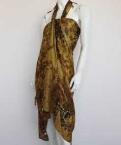 PAREO HINDU BATIK CON FLECOS MONOCOLOR ESTAMPA SOL MEDIO ROSTRO 100 X 180 CM.