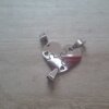 DIJE DE ACERO CORAZÓN PARA PARTIR X 3 CON CORAZONES CALADOS. 27 X 22 MM