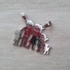 DIJE DE ACERO FAMILIA CON 1 NENA, 1 NENE Y 1 PERRO. 32 X 23 MM