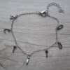 PULSERA DE ACERO ESPEJITO CON LETRAS FORMANDO FRASE "ACTITUD". LARGO 17,5 CM + 4 CM EXT.