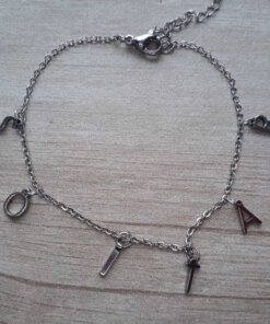 PULSERA DE ACERO ESPEJITO CON LETRAS FORMANDO FRASE "SOLTAR". LARGO 17,5 CM + 4 CM EXT.
