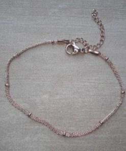 PULSERA DE ACERO DORADO ROSE MALLA PLANA CON BOLITAS. LARGO 17,5 + 4 CM EXT.