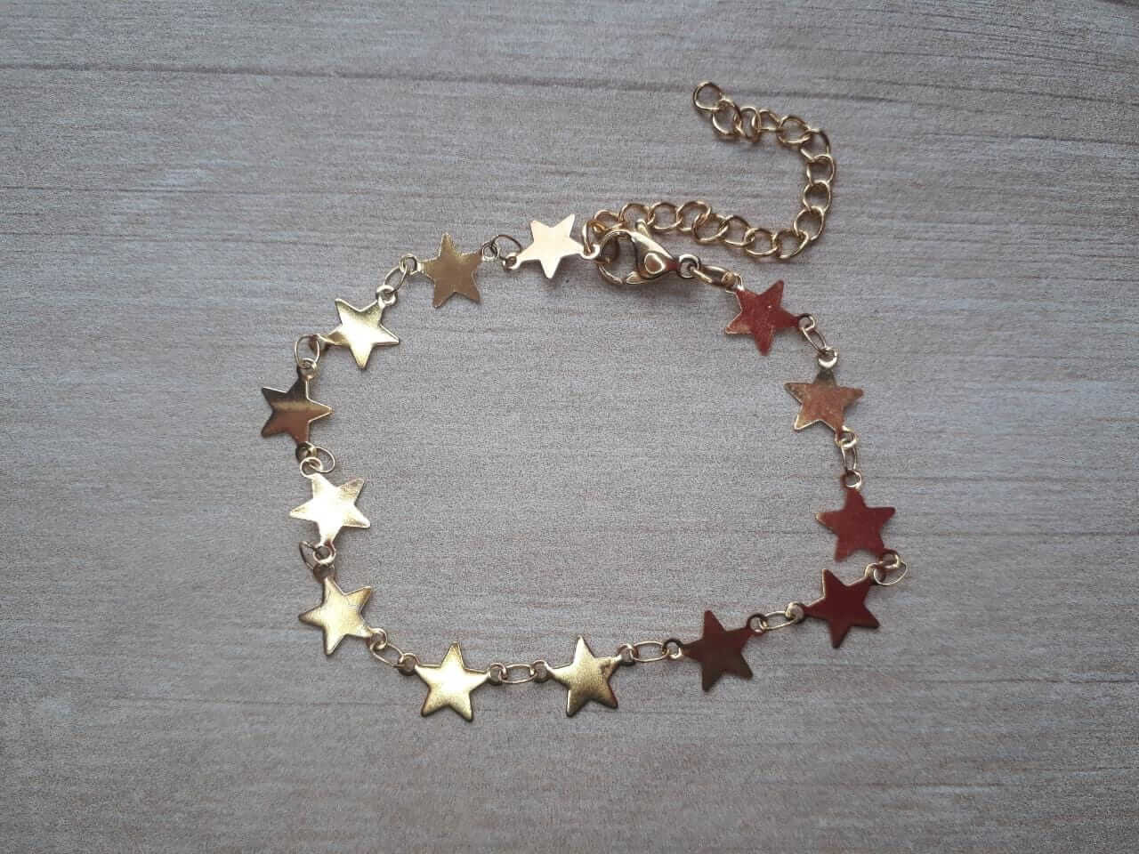 PULSERA DE ACERO DORADO ESLABÓN CONECTOR ESTRELLA. LARGO 17,5 + 4 CM EXT.