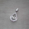 DIJE DE ACERO LAGRIMA DE STRASS CON CORAZÓN EN SU INTERIOR. 16 X 25 MM