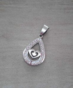 DIJE DE ACERO LAGRIMA DE STRASS CON CORAZÓN EN SU INTERIOR. 16 X 25 MM