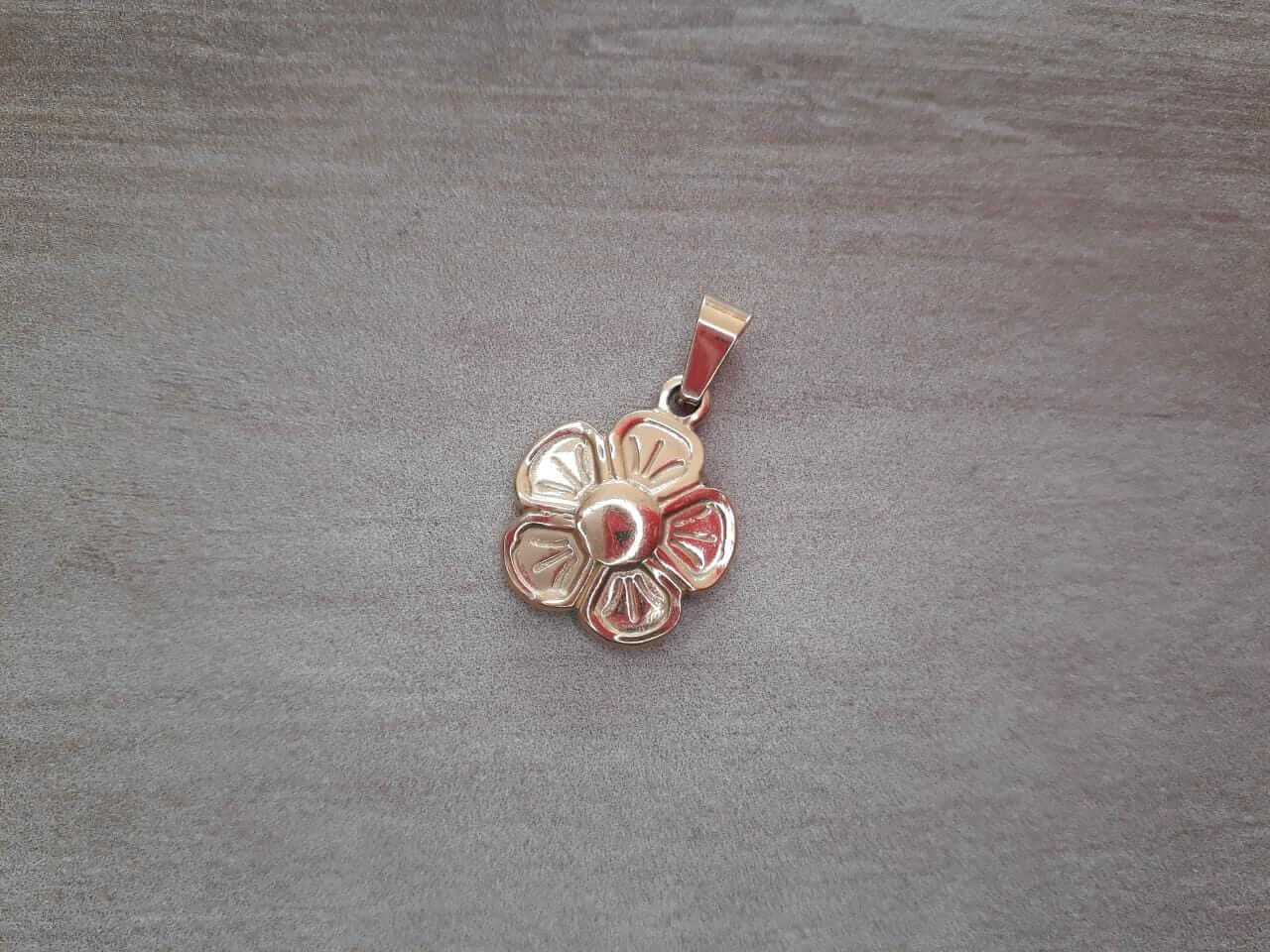 DIJE DE ACERO DORADO FLOR 16 MM