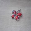 DIJE DE ACERO MARIPOSA PIEDRA ROJA. 27 X 24 MM
