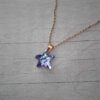 COLGANTE DE ACERO DORADO ESLABÓN ESPEJITO 0.4 CON ESTRELLA DE MAR 15 MM TORNASOL. LARGO 45 CM