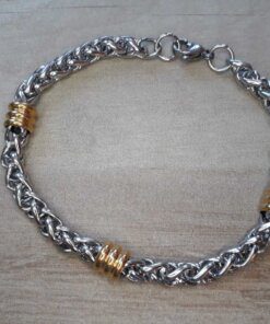 PULSERA DE ACERO ESPIGA 6.0 CON APLIQUE DORADO.