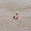 DIJE DE ACERO ROSÉ OJO TURCO. 13 X 12 MM