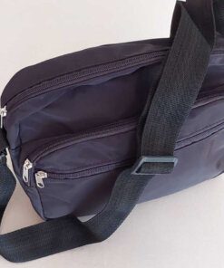 MORRAL NACIONAL IMPERMEABLE CON TRIPLE CIERRE COLOR NEGRO.