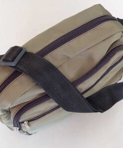 MORRAL NACIONAL IMPERMEABLE CON TRIPLE CIERRE COLOR VERDE.