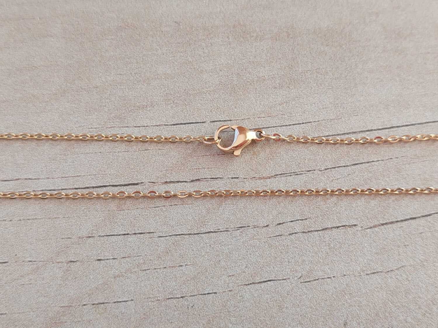 CADENA DE ACERO DORADO ESPEJITO 0.4. Paquete x 10 unidades