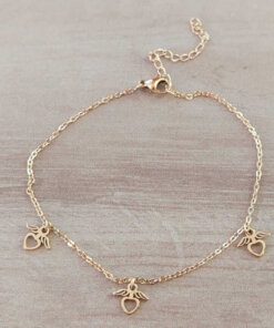 TOBILLERA DE ACERO DORADO ESPEJITO CON 3 CORAZONES ANGELITOS. LARGO 21,5 + 4,5 CM EXT.