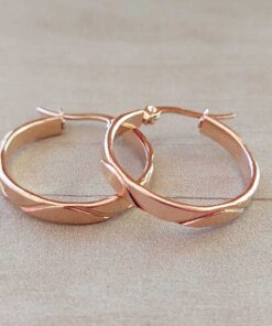 ARO ARGOLLA DE ACERO ROSÉ CON UNA RAYA ONDULADA. DIÁMETRO 25 MM