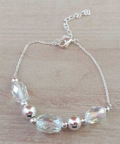 PULSERA DE ACERO BLANCO ESPEJITO CON CENTRO MOSTACILLAS TRANSPARENTES Y BOLITAS. LARGO 17 + 3.5 CM EXT.