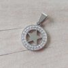 DIJE DE ACERO REDONDO DE STRASS CON ESTRELLA EN SU INTERIOR. DIÁMETRO 20 MM