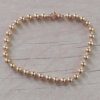 PULSERA DE ACERO DORADO ESLABÓN BOLITAS 4 MM. LARGO 19 CM