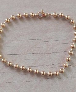 PULSERA DE ACERO DORADO ESLABÓN BOLITAS 4 MM. LARGO 19 CM