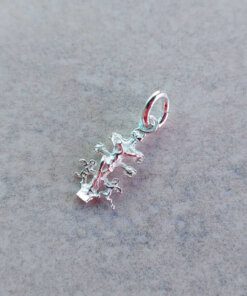 DIJE PLATA CRUZ CARAVACA. 10 X 15 MM. PESO APROX 0.60 GRS.