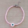 PULSERA DE TANZA CON MOSTACILLAS ROSA Y OJO TURCO CON TERMINAL DE ACERO. LARGO 18 + 3 CM EXT.