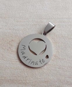DIJE DE ACERO "MADRINA TE (CORAZÓN)". MEDIDA 23 MM
