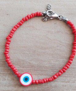 PULSERA DE TANZA CON MOSTACILLAS ROJAS Y OJO TURCO ROJO CON TERMINAL DE ACERO. LARGO 18 + 3 CM EXT.