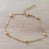 PULSERA DE ACERO DORADO ESPEJITO CON BOLITAS 3 MM. LARGO 19 CM