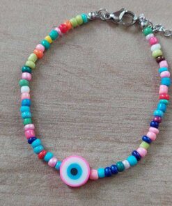 PULSERA DE TANZA CON MOSTACILLAS MULTICOLOR Y OJO TURCO FUCSIA CON TERMINAL DE ACERO. LARGO 18 + 3 CM EXT.
