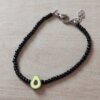 PULSERA DE TANZA CON MOSTACILLAS NEGRA Y PALTA CON TERMINAL DE ACERO. LARGO 17 + 3 CM EXT.