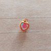 DIJE DE ACERO DORADO CORAZÓN 6 X 8 MM CON CUBIK TORNASOL
