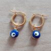 ARO DE ACERO DORADO ARGOLLA 14 MM CON OJO TURCO AZUL