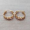 ARO DE ACERO DORADO ARGOLLA CINTA 18 MM CON INFINITOS CALADOS.