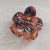 BROCHES MEDIANOS FLOR 50 MM CAREY X 12 UNIDADES.