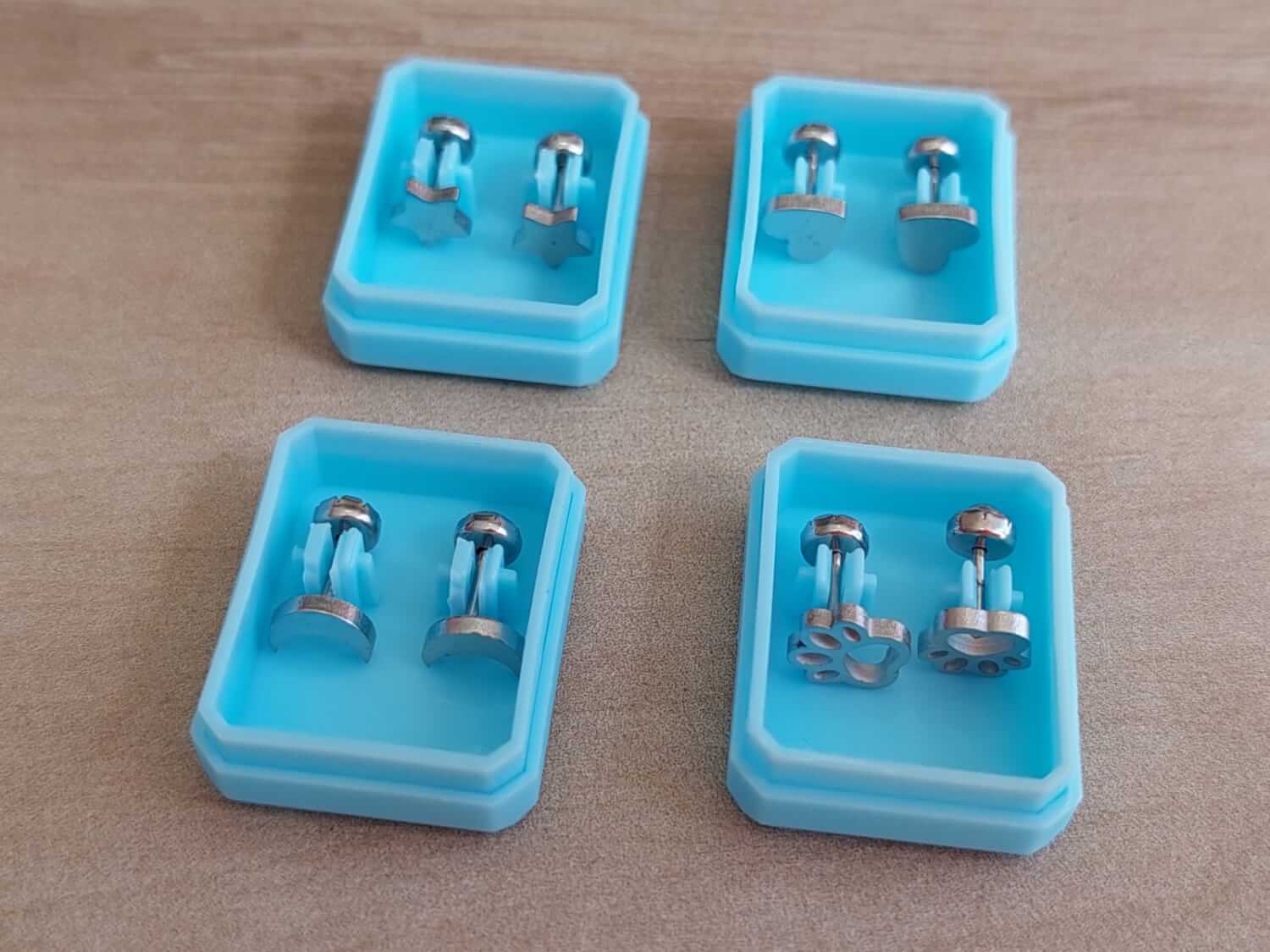 ABRIDOR ACERO FIGURAS SURTIDAS X 12 PARES