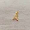 DIJE DE ACERO DORADO LETRA 12 MM CON STRASS.