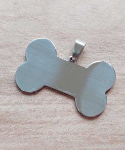 DIJE DE ACERO PARA GRABAR HUESO PULIDO AMBOS LADOS. 40 X 25 MM- ESPESOR 1,5 MM.