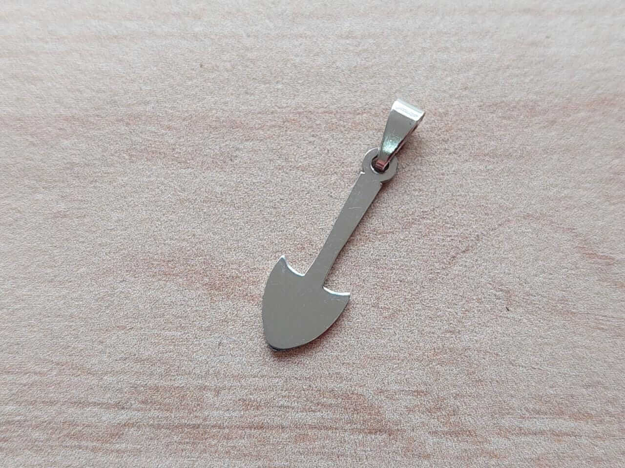 DIJE DE ACERO PALA. 9 X 26 MM