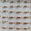 ANILLOS DE ACERO DORADO C/CUBIK X 36 UNIDADES SURTIDOS EN MEDIDAS. (MEDIDAS DEL 16 AL 19)