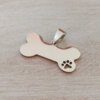 DIJE DE ACERO HUESO PARA GRABAR CON HUELLA CALADA. MEDIDAS 32 X 16 MM. ESPESOR 1 MM