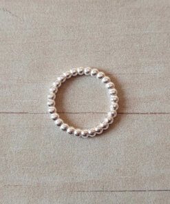 ANILLO DE ACERO BLANCO BOLITAS.