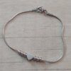 PULSERA DE ACERO COLA DE RATON CON BOLITAS Y CORAZÓN PASANTE. LARGO 19