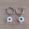 ARO DE ACERO ARGOLLA 14 MM CON DIJE OJO TURCO ROSA COLGANTE.
