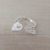 ANILLO DE ACERO BLANCO ALAS CON MICRO PAVE CRISTAL. N°7