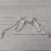 ARO DE ACERO BLANCO SUSANITO CON STRASS BLANCO Y CADENA COLGANTE UNIDA A FRU FRU Y RAYO COLGANTE