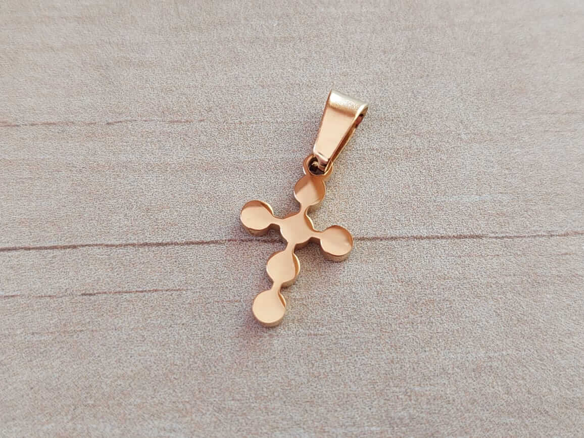 DIJE DE ACERO DORADO CRUZ CON CÍRCULOS. 12 X 15 MM